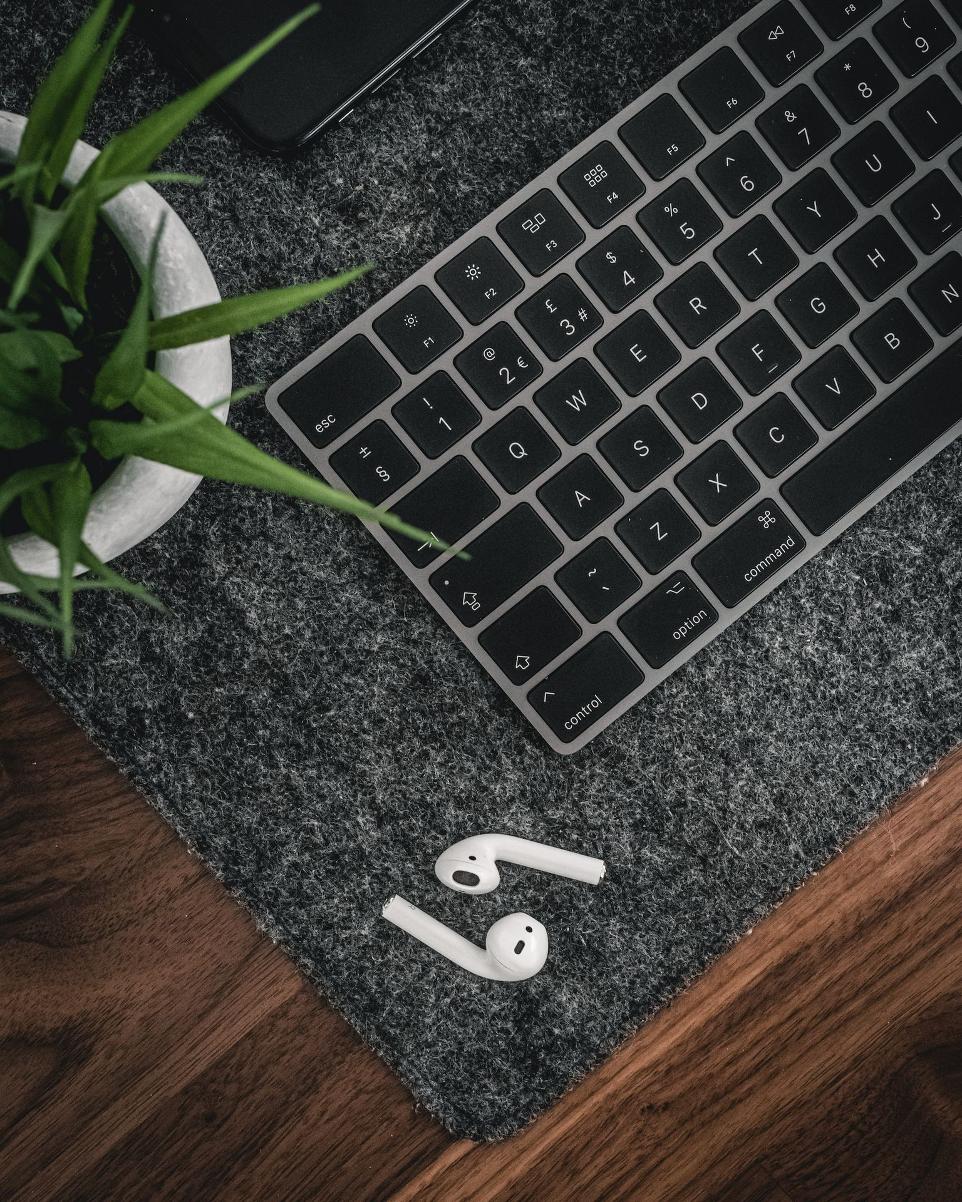 apple keyboard on gray table